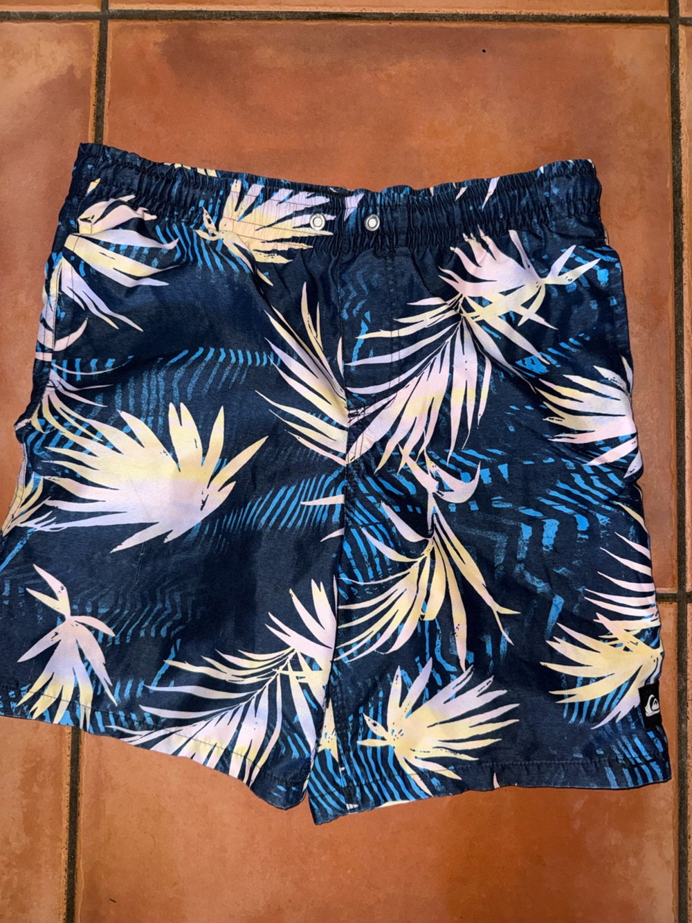 Quiksilver Navy Swim Shorts with Pastel Leaf Accent